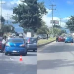 ¡Amor en plena calle! Pareja se besa y abraza tras choque en Tegucigalpa